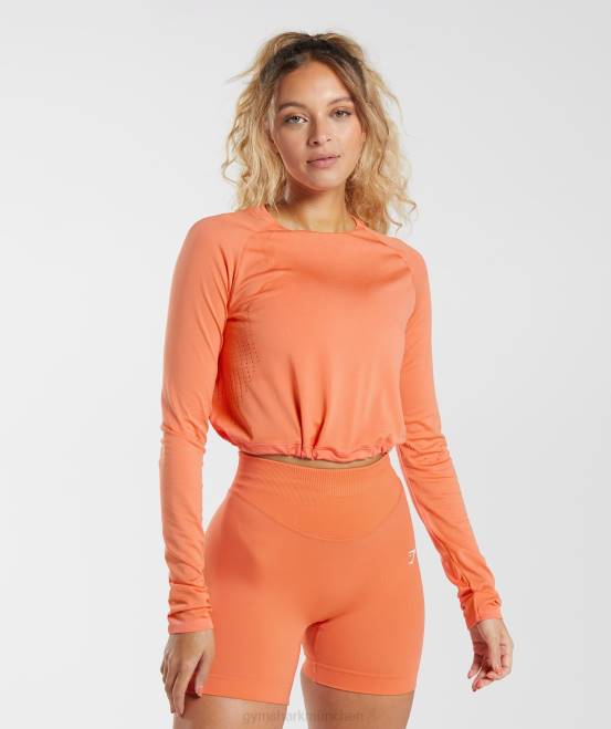 Luft- und Raumfahrtorange Kleidung Gymshark Frauen Nahtloses Sweat-Crop-Top mit langen Ärmeln 04P8456
