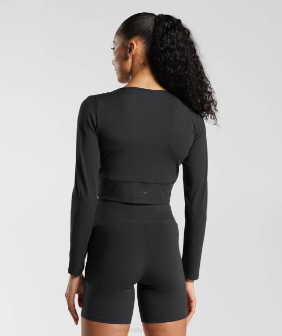 Schwarz Kleidung Gymshark Frauen Crossover-Langarm-Crop-Top 04P8498