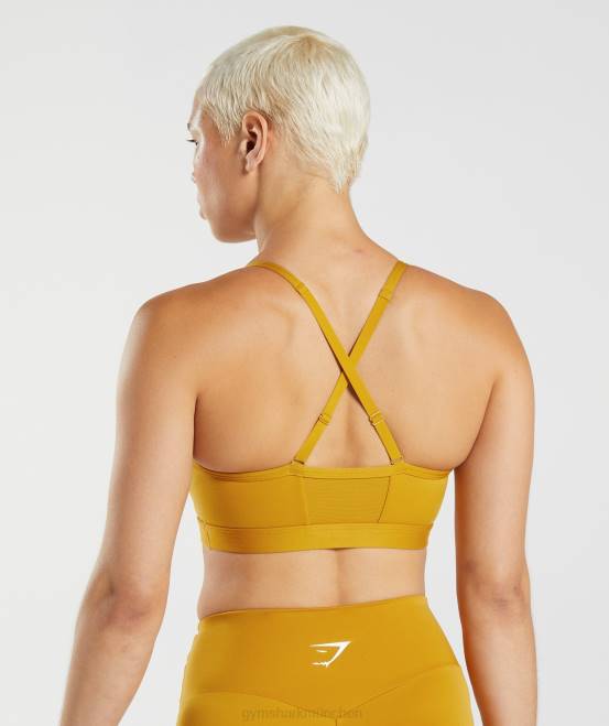 Kurkumagelb Kleidung Gymshark Frauen geraffter Sport-BH 04P8228