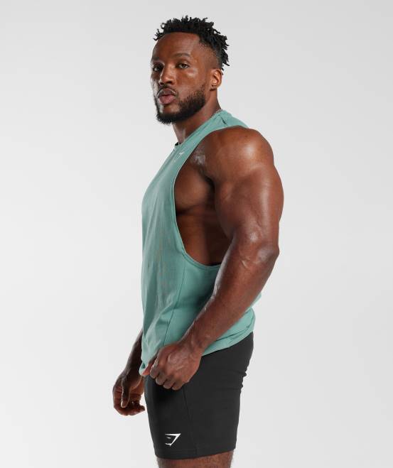 Tinte blaugrün (ausverkauft) Kleidung Gymshark Männer Reagieren Sie mit dem Drop-Arm-Tank 04P8973