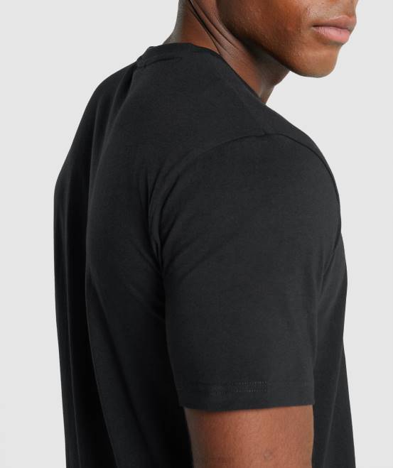 Schwarz Kleidung Gymshark Männer T-Shirt mit Wappen 04P8574