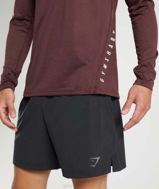 gebackener kastanienbrauner/schwarzer Mergel Kleidung Gymshark Männer Sport-Langarm-T-Shirt 04P8681